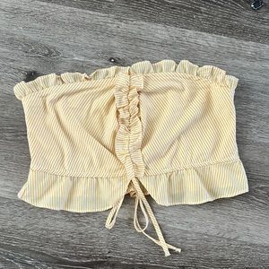 Yellow and white striped strapless cropped top. Size medium